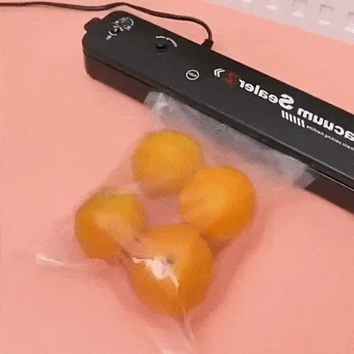 SELLADORA AL VACÍO PRO™ + ROLLO DE 5 METROS – CONSERVA FRESCO TODO POR MÁS TIEMPO.